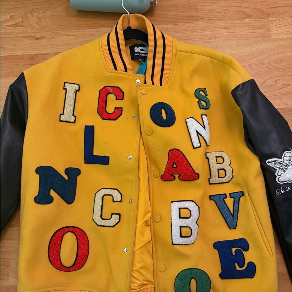 Yellow Varsity Jacket with Colorful Patches